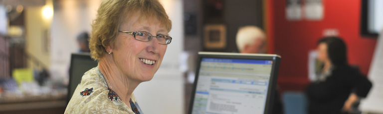 A woman on a computer workstation